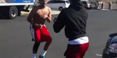 2 Dudes Fight In A Parking Lot.