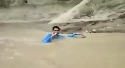 Pakistani Anchor Reporting While Neck-Deep in Water