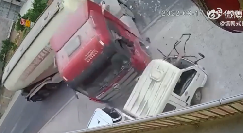 Van Driver Nearly Ejected By Red Truck