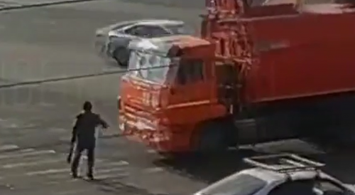 Man Ran Over By Garbage Truck In Russia