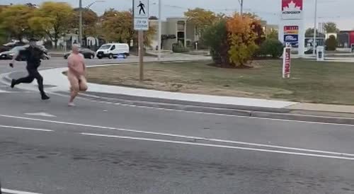 Naked man chased down Oakville road by police