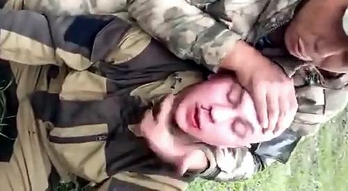 Russian Soldier Kicked in the Face Over Threats to Kill Kazakh Comrades