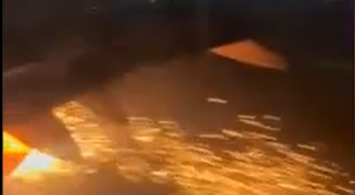 Terrified passenger films plane wing catch fire during takeoff