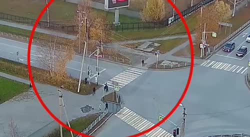A cyclist crossed the road at a red light and was hit by a car ⁠