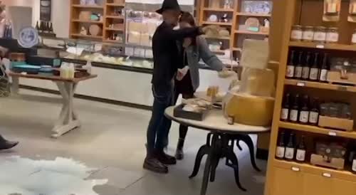 Animal Rebellion mob pour milk over supermarket floors