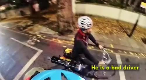 Moment motorist confronts cyclist