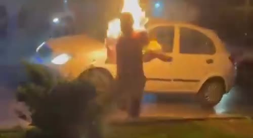 Iranian Protestor Catches Fire