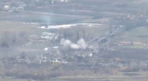 Russian artillery destroys a Ukrainian vehicle