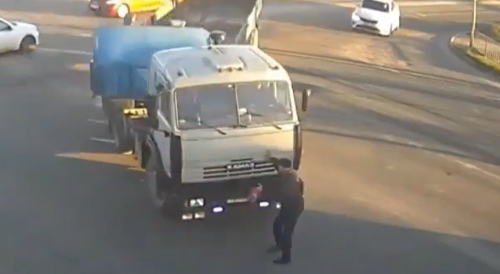 Man Ran Over By Huge Truck In Russia, Survives