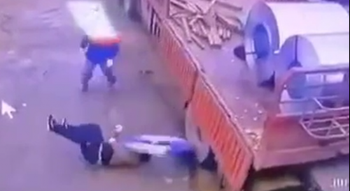 Chinese Worker Drops Load on HIMSELF