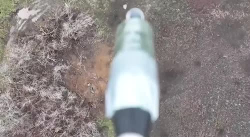 Soldiers in a ditch are hit with drone dropped