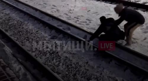 He saves a man who tried to throw himself under a train