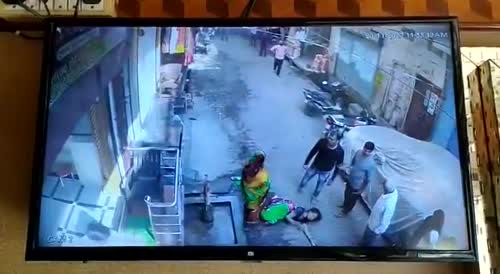 son beaten his mother for asking account of money.