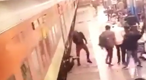 Sick Bastard Pushes Man Under Train