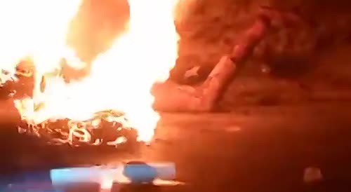 Thief Burns On The Roadside In Nigeria