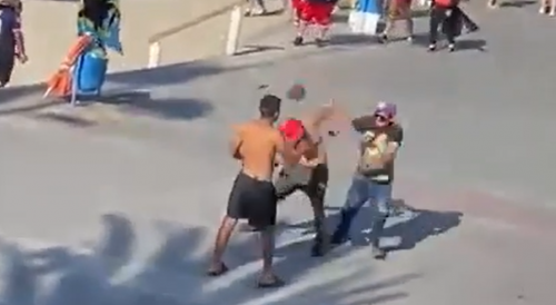 Man Takes Rock To The Dome During Street Fight In Chile