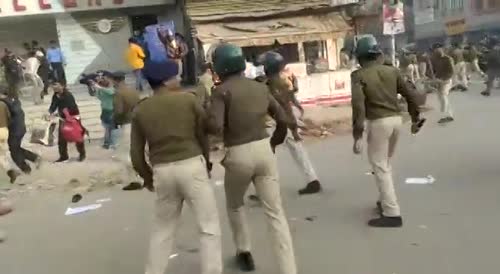 Police Beat Protesters With Sticks In India