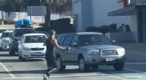 Australia: Man Attacks Random Cars With A Metal Bar