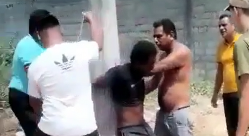 Shortly After Robbing A Woman Criminal Was Beaten, Tied To The Pole In Ecuador