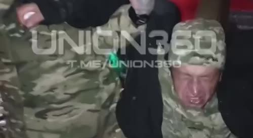 A Ukrainian officer drunk as a pig.
