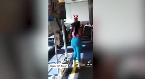 WOMAN RAGES at AIRPORT