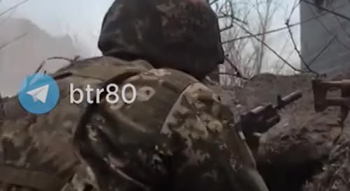 Ukraine troops in trench take direct hit