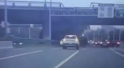 SUV falls from a bridge on a highway in Detroit.