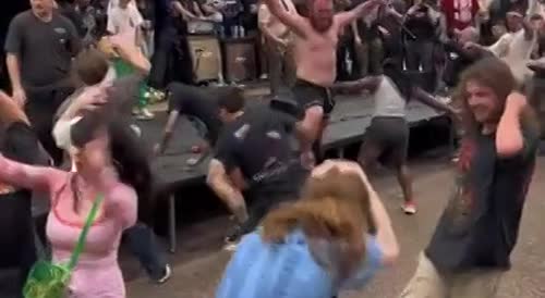 Woman tries to survive in hardcore moshpit