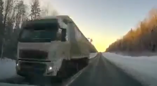Ice Falls On Dashcam Car In Rusiia
