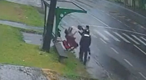 Killers KO Dude With A Helmet, Shoot Him Twice On The Rainy Day