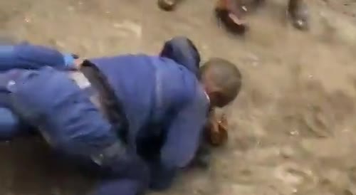 Congo Cops Fighting In The Mud