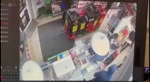 Store Owner Dodges Bullets During Robbery In Poland