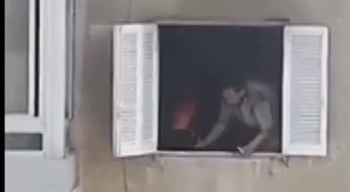 Scared man jumps from a window to escape burning building(repost)
