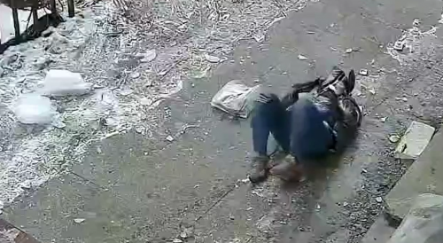 Woman Knocked Out By Falling Ice In China