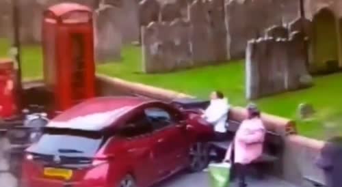 Woman Hit By Car While Sitting On Bench!(repost)