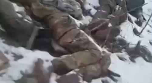 Many Ukrainian frozen corpses, in abandoned positions