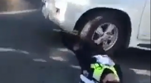 Traffic Cop Ran Over In China