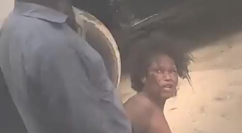 Woman Stripped Topless During Arrest In Nigeria