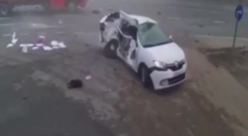 Car collides with a truck.