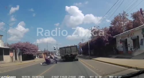 Biker runs head on into a truck.