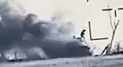 Direct Rocket Hit on Armored Vehicle, Soldier On Top