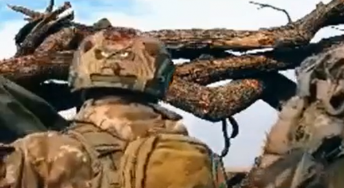 Russian Sniper Shoots Ukrainian Soldier in the Head