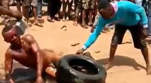 African Mob Keeping the Art of "Necklacing" Alive