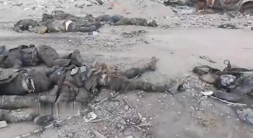 Drowned Ukrainian soldiers who fell from a destroyed bridge into the river, on an armored personnel carrier