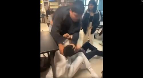 different angle of TEACHER TRIES BREAKING UP FIGHT, GETS DESTROYED, SPARKING CALLS FOR SECURITY