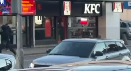 The UK Has Fallen As Masked Thugs Slash Each Other With Machetes In Front Of KFC