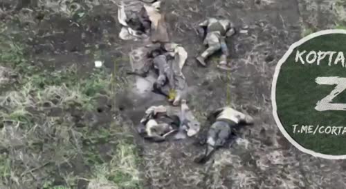 Ukrainian soldiers rest after a hard battle