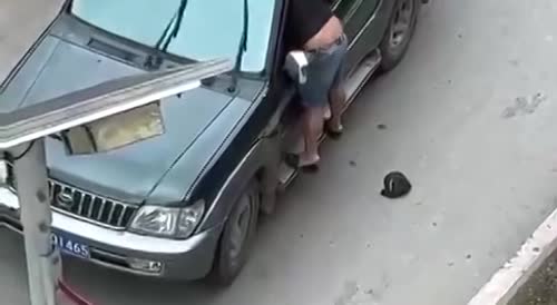 Man goes for a spin after road rage confrontation in China.