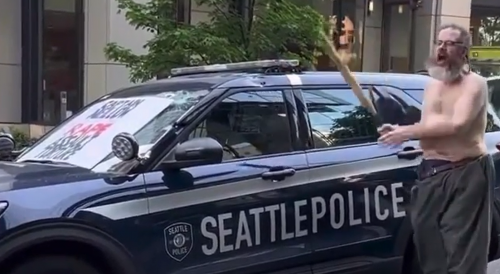 Most Sane Man in Seattle Unloads on Police Car