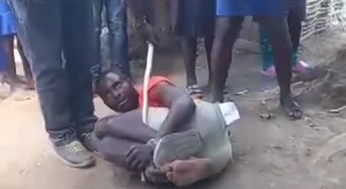 Woman Beats Tied Village Thief